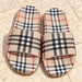 Plaid check slides in beige - detail view