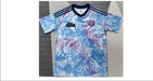 Patterned soccer jersey in light blue with tropical print