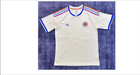 Soccer jersey in white with blue, red and orange striped shoulders