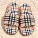 Plaid check slides in beige - front view