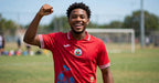 Haiti red jersey worn on a soccer field