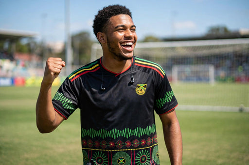 Jamaica black and green jersey worn on a soccer field
