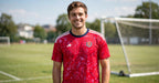 Red patterned jersey worn outdoors