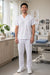 White scrub set worn by a healthcare worker